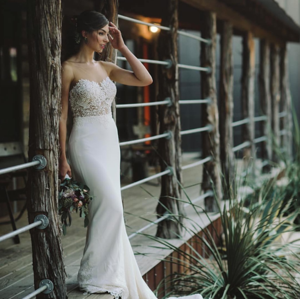 Model wearing a white gown 2