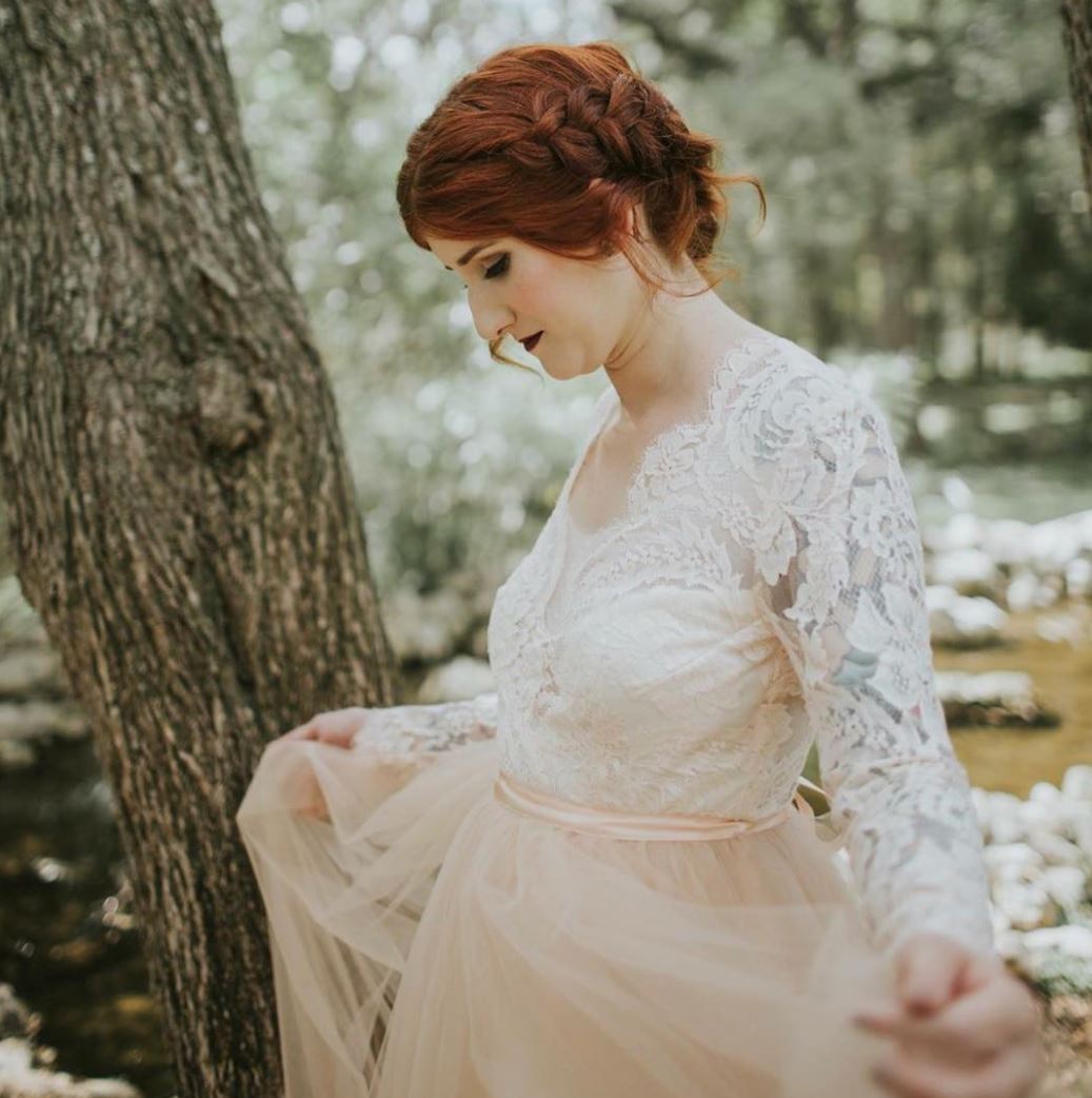 Model wearing a white gown